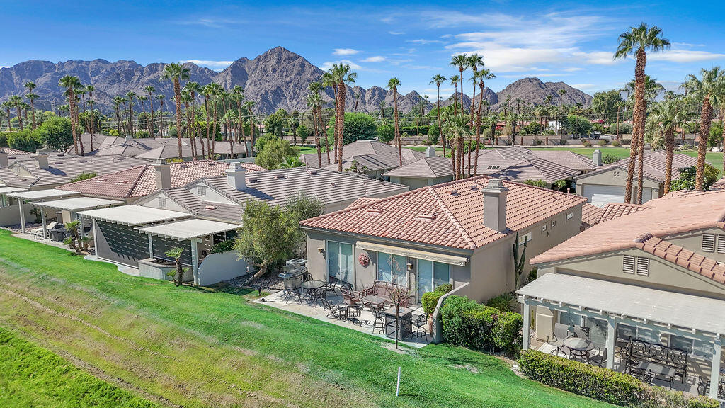 78079 Calle Norte La Quinta, CA 92253 - Photo 43 of 51 a view of a house with a garden and a yard