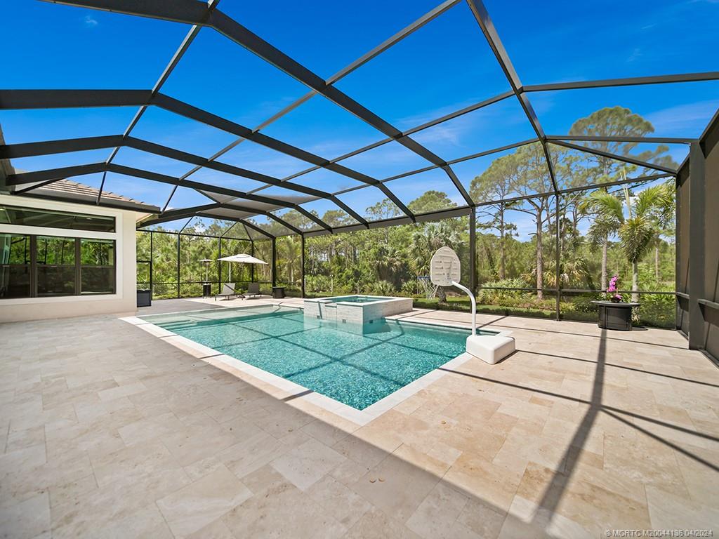 3246 Southwest Loriope Loop Palm City, FL 34990 - Photo 28 of 37 a view of yard with patio