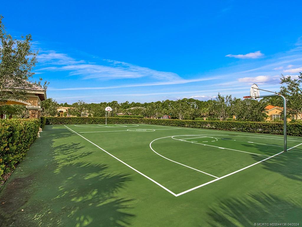 3246 Southwest Loriope Loop Palm City, FL 34990 - Photo 36 of 37 a view of a tennis court