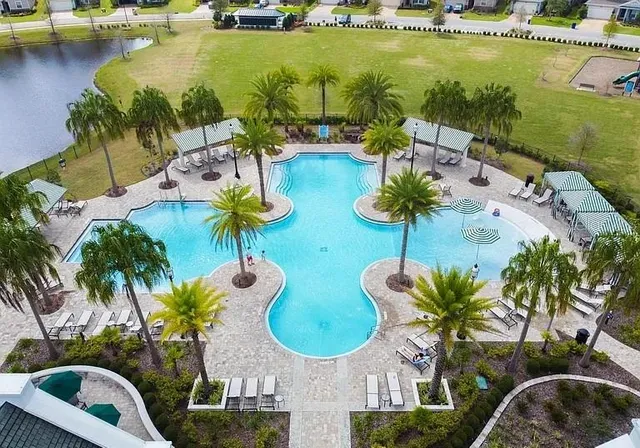 a view of an ocean house swimming pool and ocean view