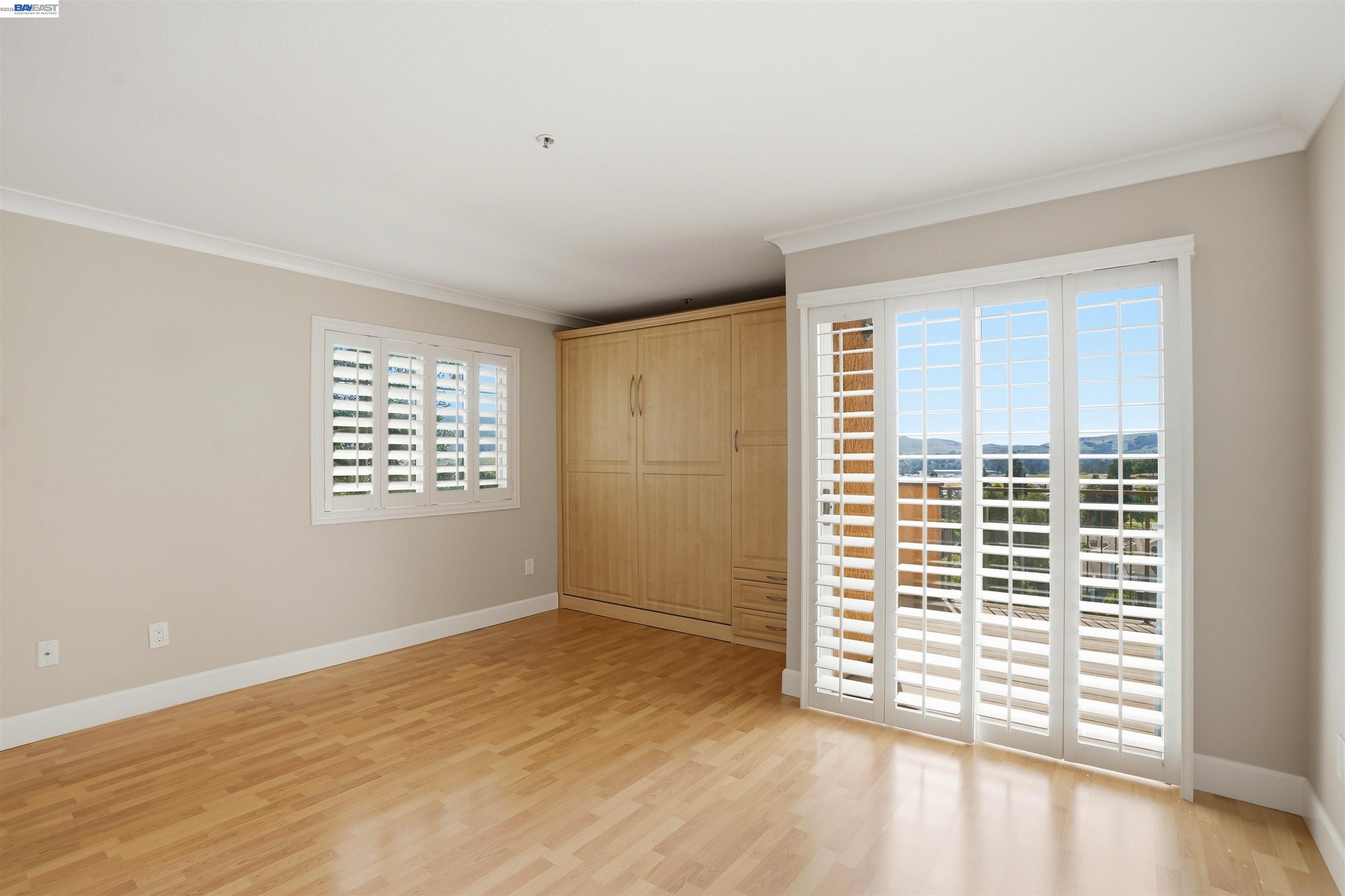 735 Watson Canyon Court, Unit 218 San Ramon, CA 94582 - Photo 4 of 18 a view of an empty room with a window