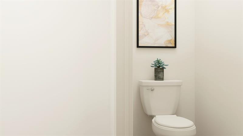 142 Vision Street Bethlehem, GA 30620 - Photo 15 of 21 a white toilet sitting next to a white wall