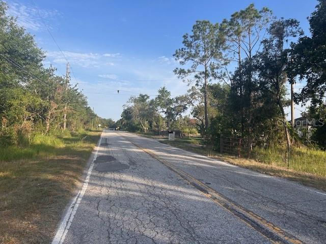 820 Stephens Road Ruskin, FL 33570 - Photo 5 of 6 a view of a yard with large tree