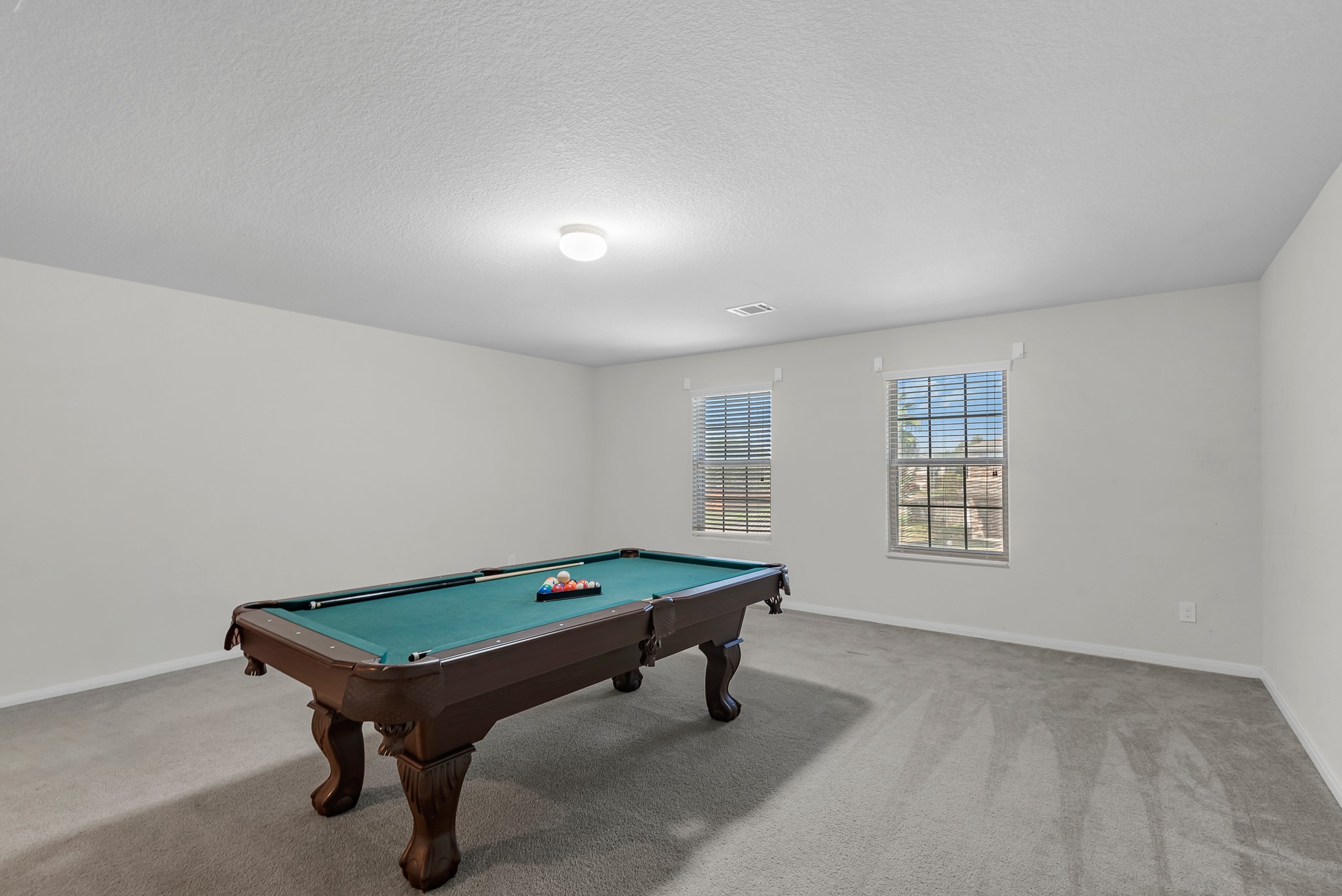 1614 Perennial Lane Rosenberg, TX 77471 - Photo 24 of 34 a room with pool table and windows