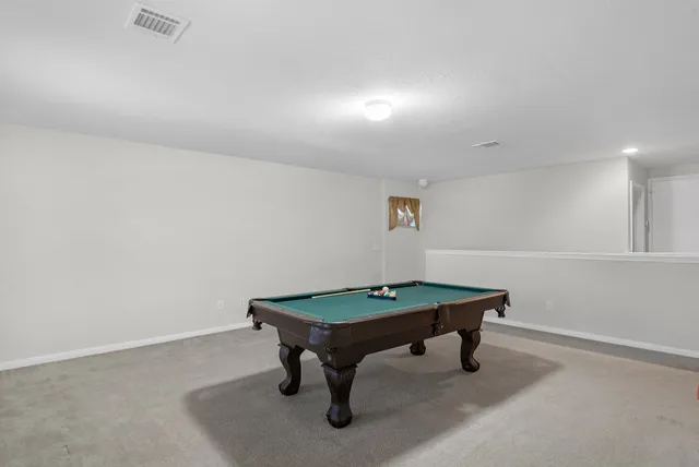 a room with pool table