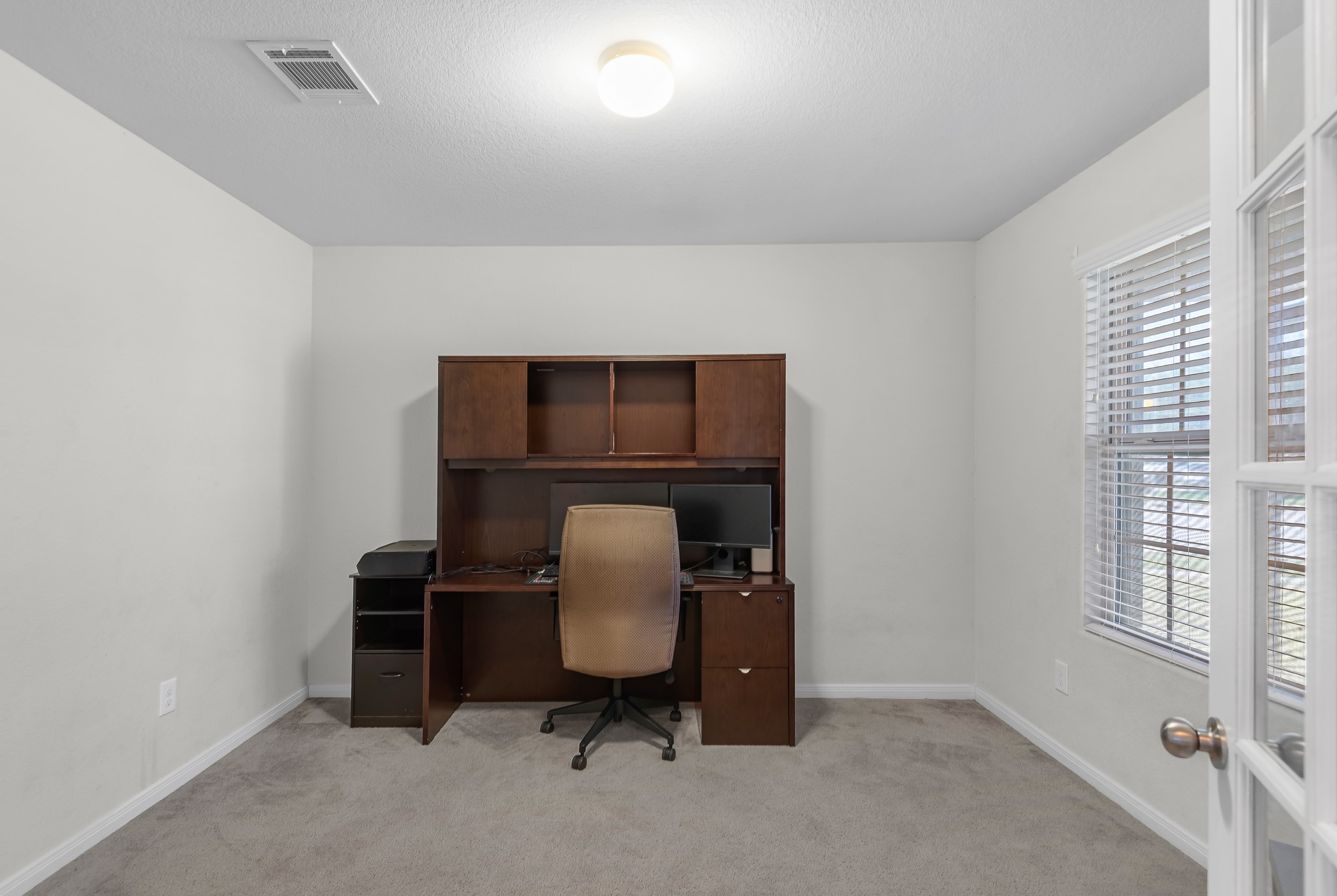 1614 Perennial Lane Rosenberg, TX 77471 - Photo 7 of 34 a workspace with furniture and window