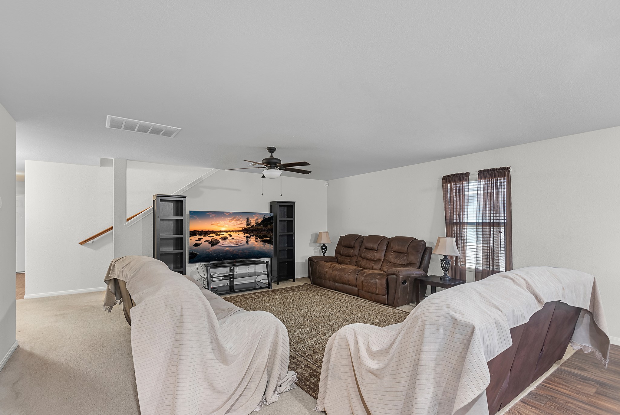 1614 Perennial Lane Rosenberg, TX 77471 - Photo 10 of 34 a living room with furniture and a flat screen tv