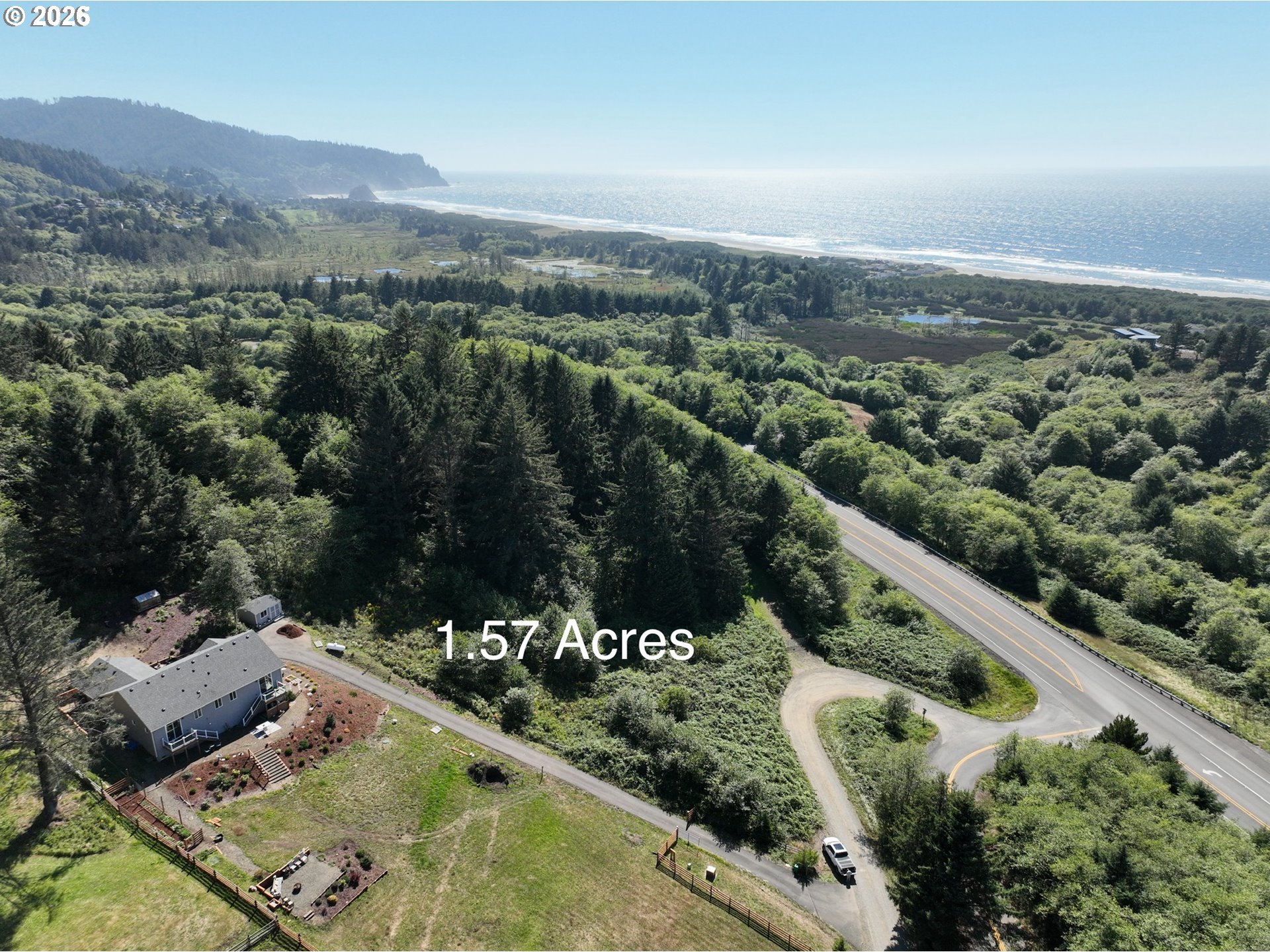 Scherzinger Road Neskowin, OR 97149 - Photo 1 of 8 an aerial view of a house with a yard