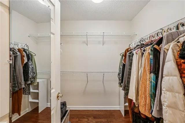 a kitchen with a stove sink and refrigerator