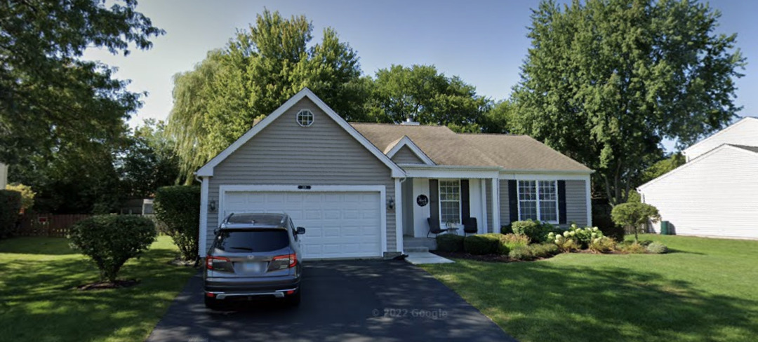 439 Pheasant Ridge Road Lake Zurich, IL 60047 - Photo 1 of 1 a view of a house with backyard