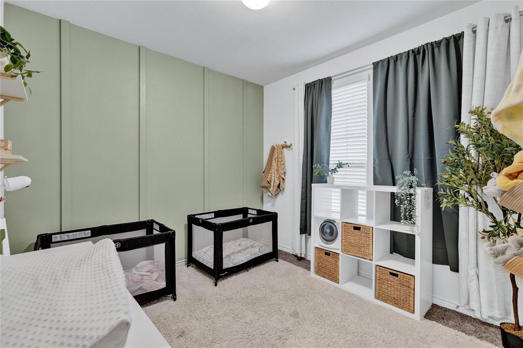 717 Rawhide Way Princeton, TX 75407 - Photo 15 of 31 a bedroom with furniture and window