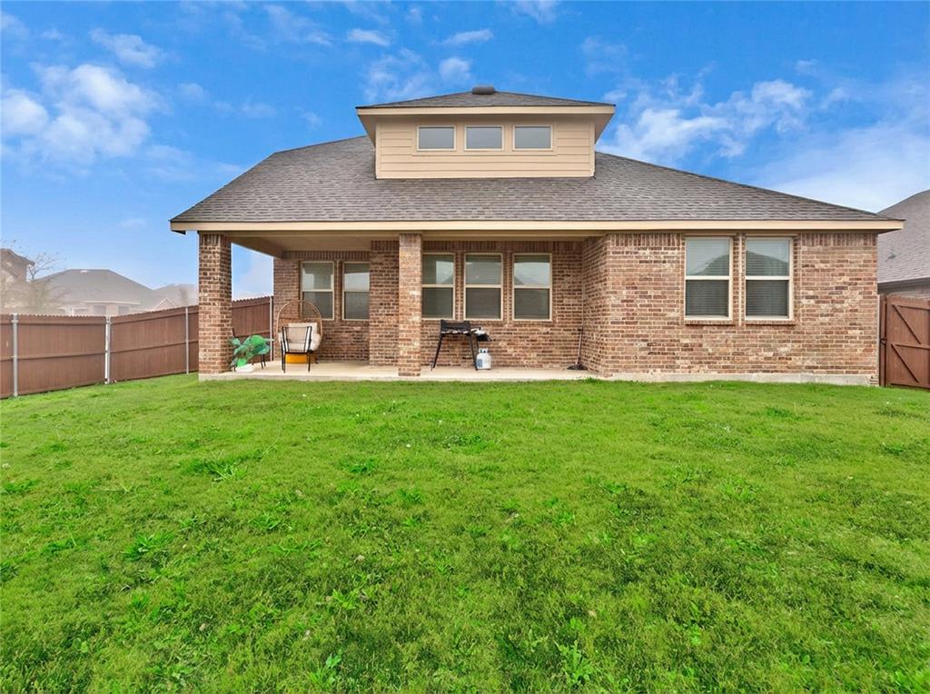 717 Rawhide Way Princeton, TX 75407 - Photo 20 of 31 a front view of a house with garden and porch