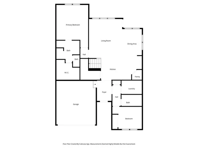 an aerial view of a house with garden space and outdoor space