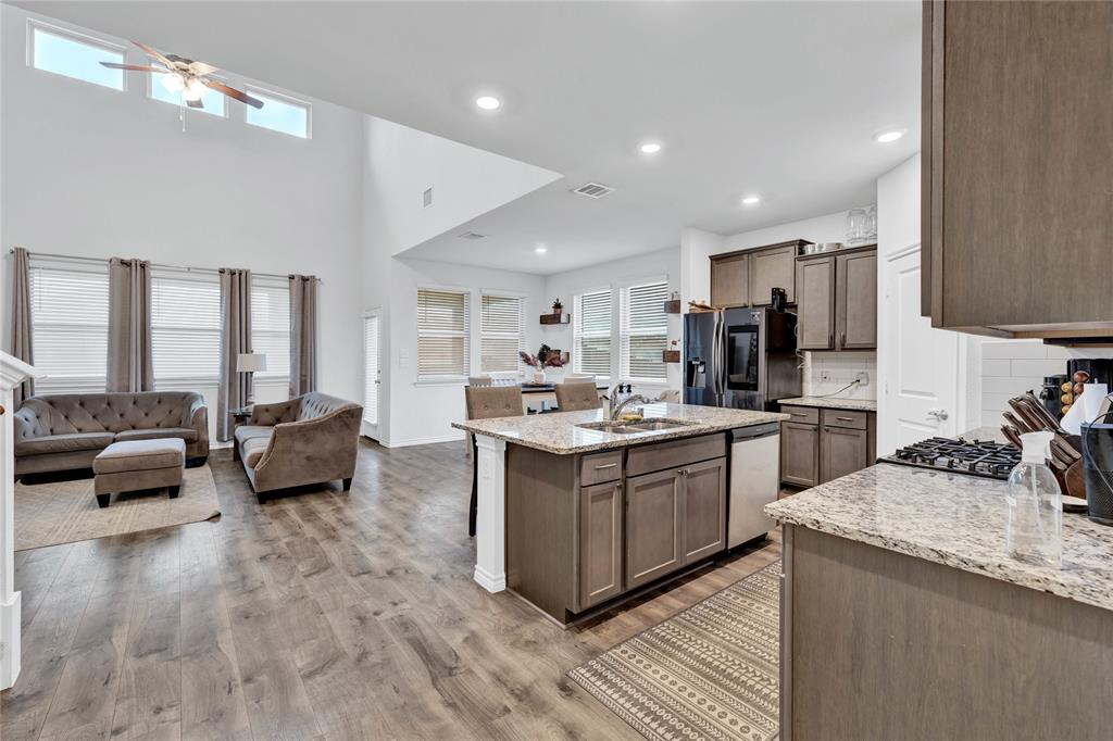 717 Rawhide Way Princeton, TX 75407 - Photo 30 of 31 a large kitchen with stainless steel appliances lots of counter top space