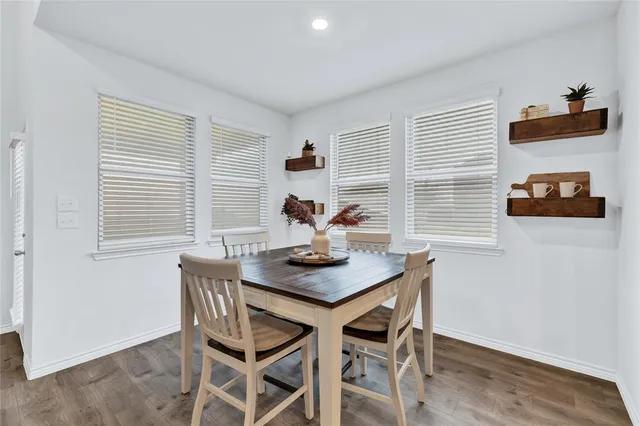 a large kitchen with stainless steel appliances lots of counter top space
