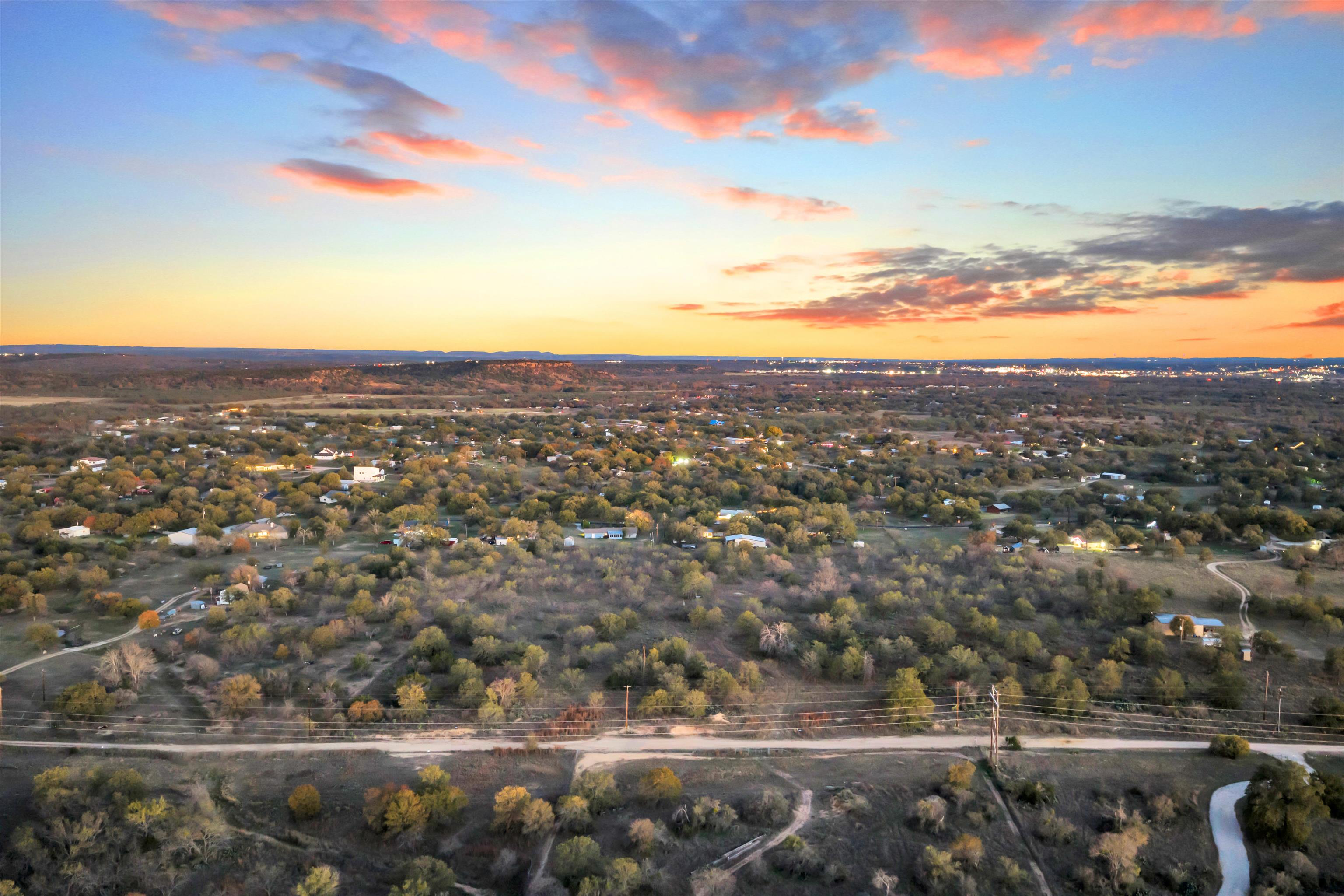 111 Quail Trail Marble Falls, TX 78654 - Photo 21 of 25 an aerial view of residential houses with outdoor space