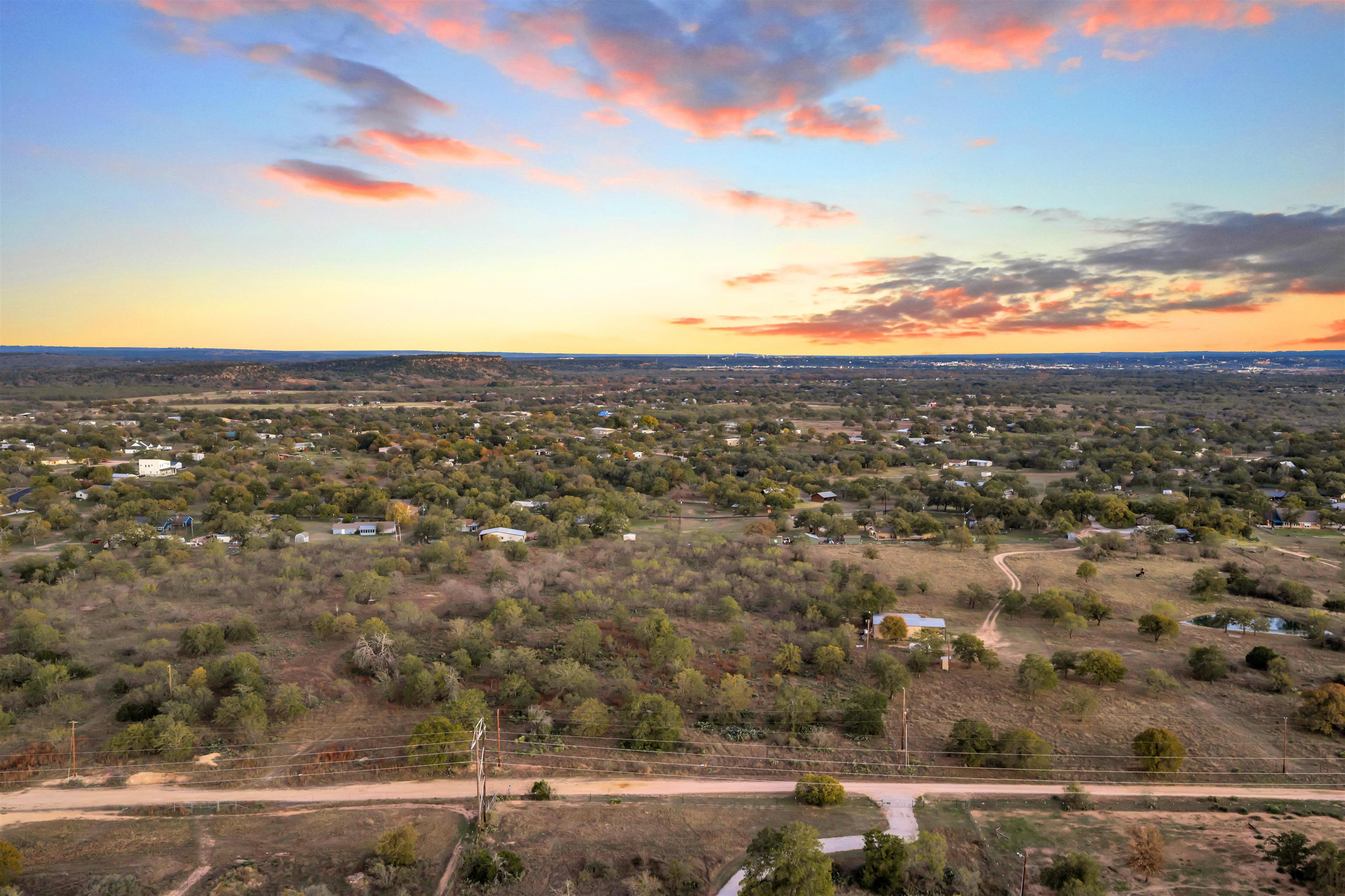 111 Quail Trail Marble Falls, TX 78654 - Photo 22 of 25 an aerial view of residential houses with outdoor space