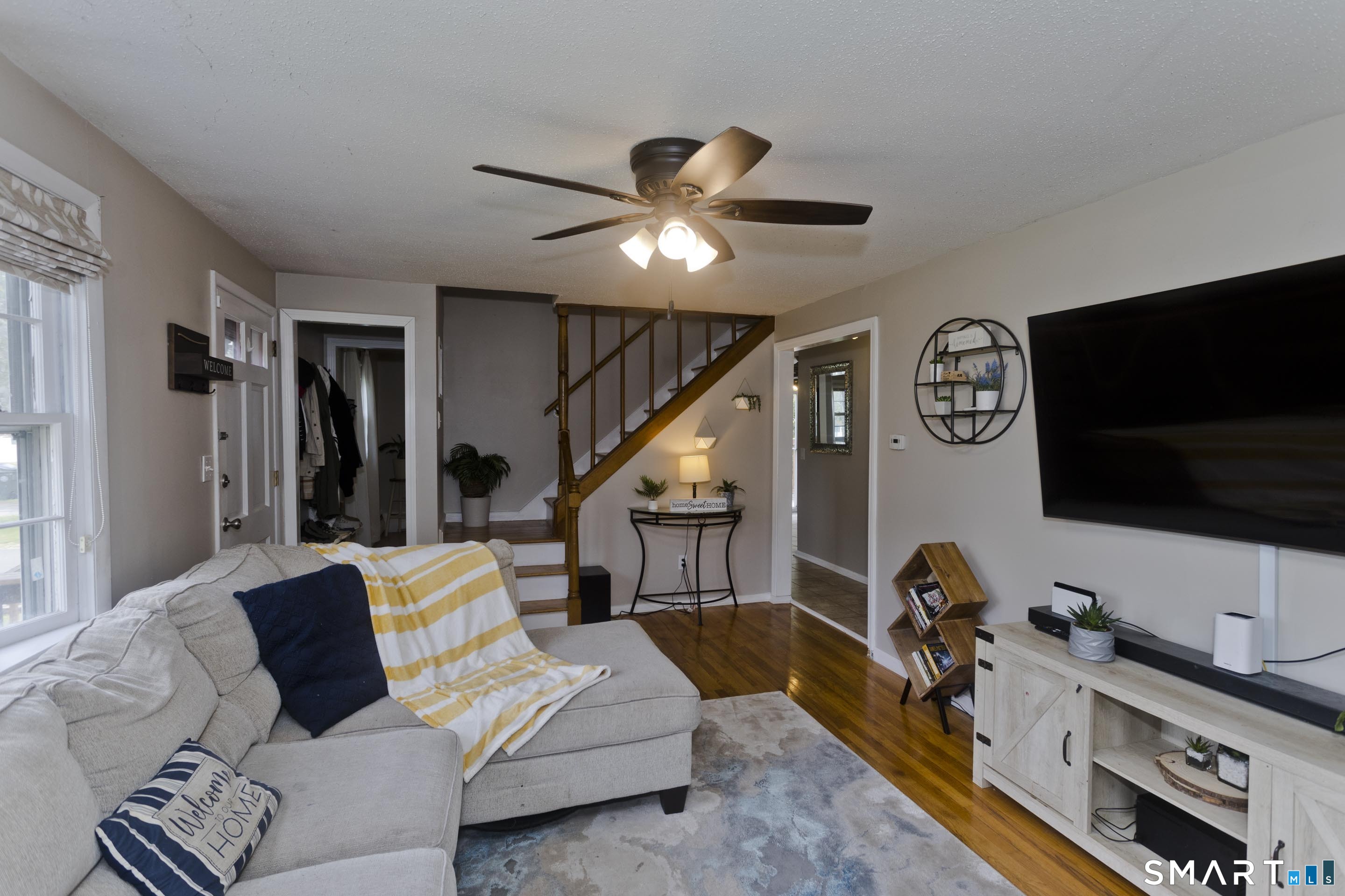 309 South Elm Street Windsor Locks, CT 06096 - Photo 12 of 38 a living room with furniture and a flat screen tv