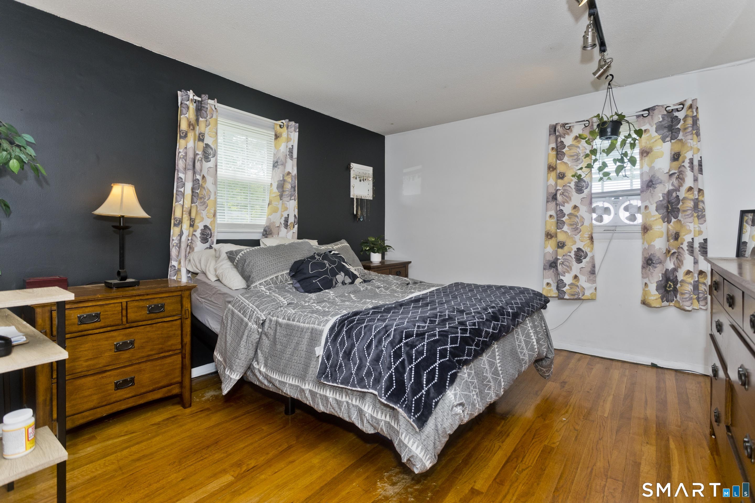 309 South Elm Street Windsor Locks, CT 06096 - Photo 13 of 38 a bedroom with a bed and a dresser
