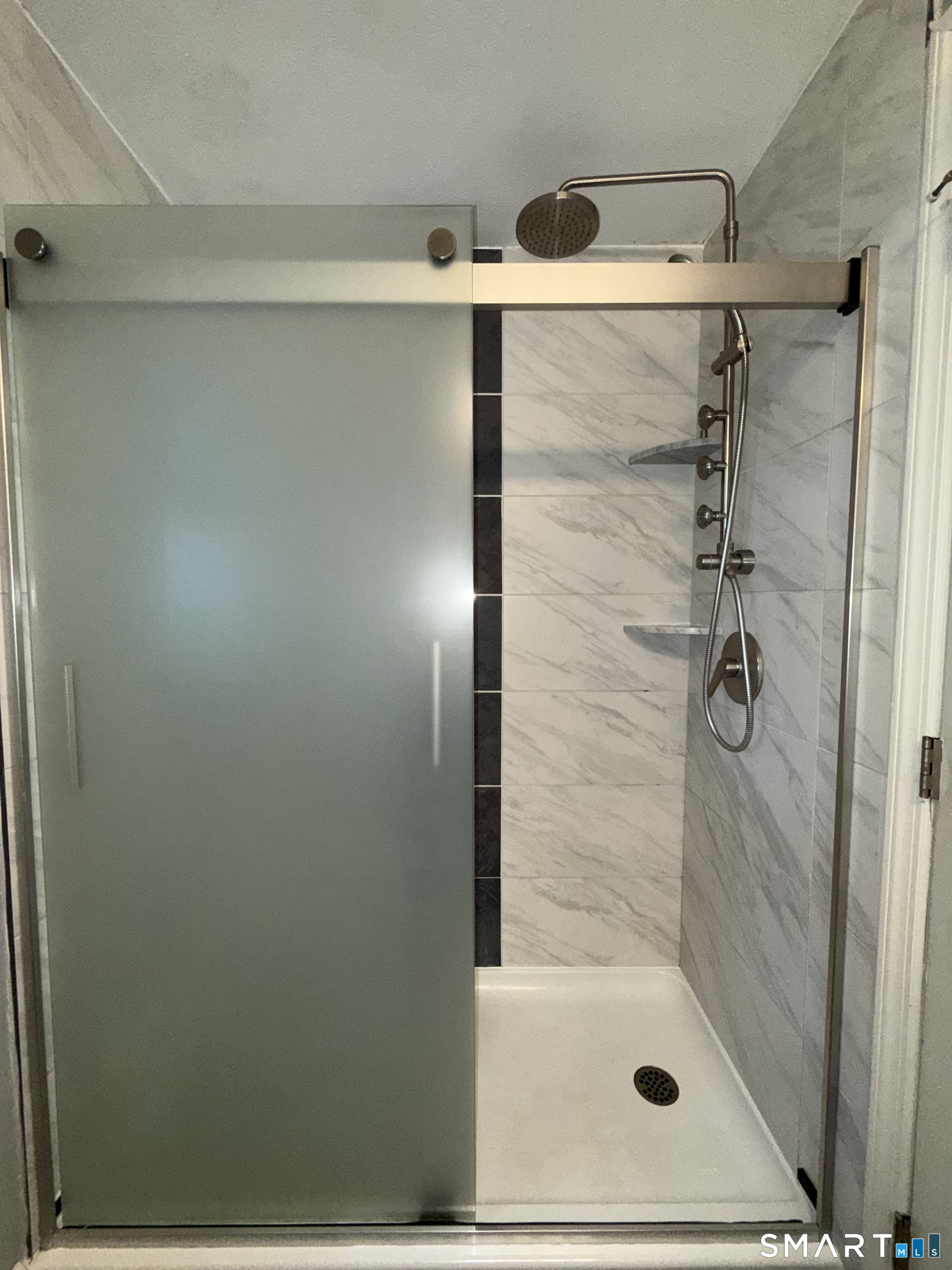 309 South Elm Street Windsor Locks, CT 06096 - Photo 16 of 38 a bathroom with a shower