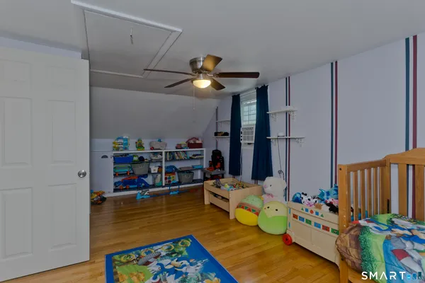a living room with lots of furniture and a rug