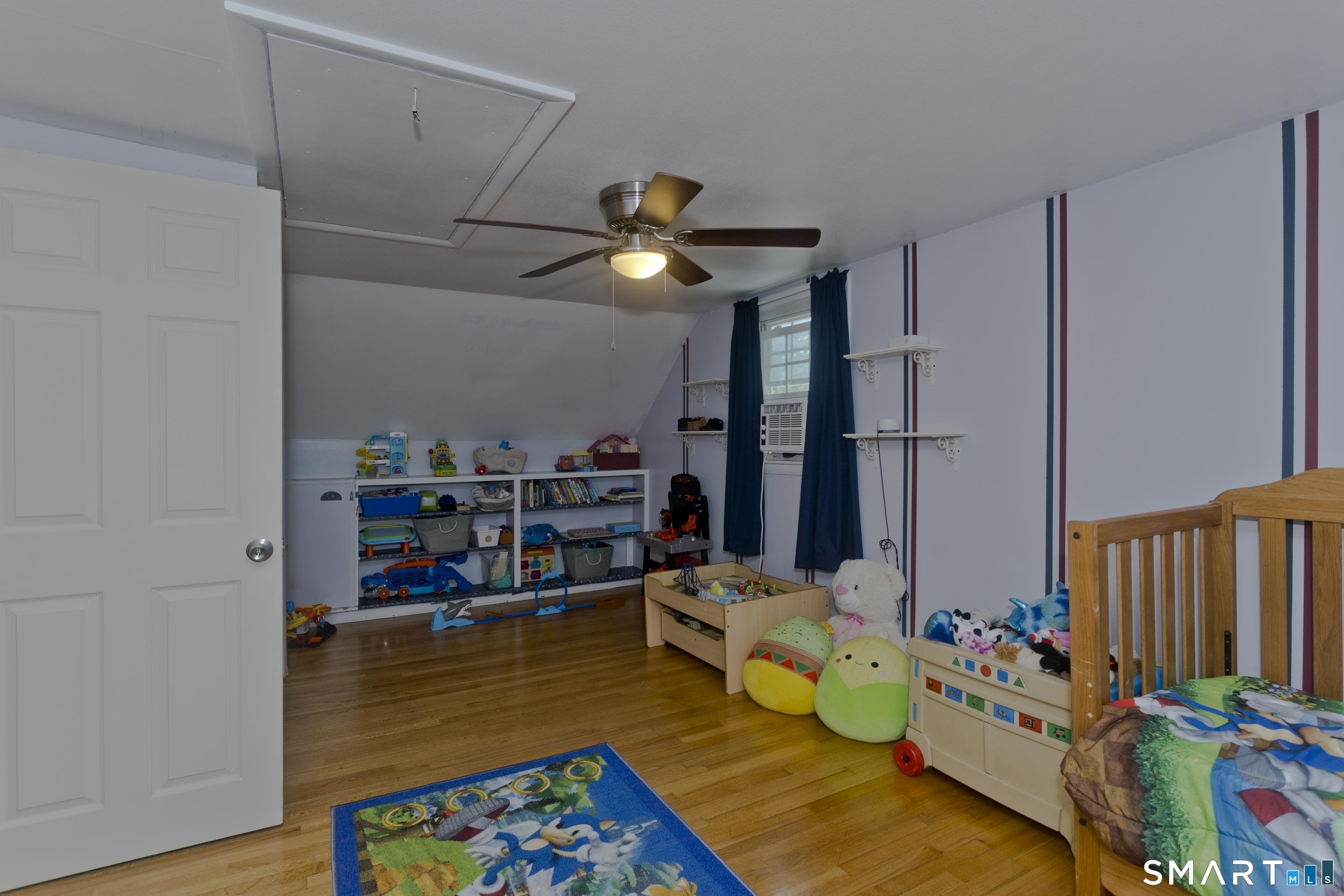 309 South Elm Street Windsor Locks, CT 06096 - Photo 21 of 38 a room with lots of furniture and clutter