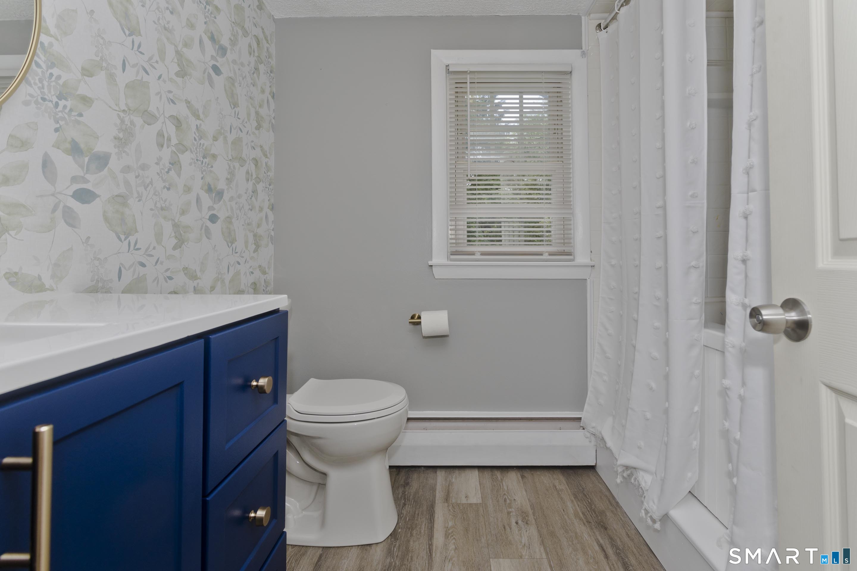 309 South Elm Street Windsor Locks, CT 06096 - Photo 24 of 38 a bathroom with a sink a toilet and shower