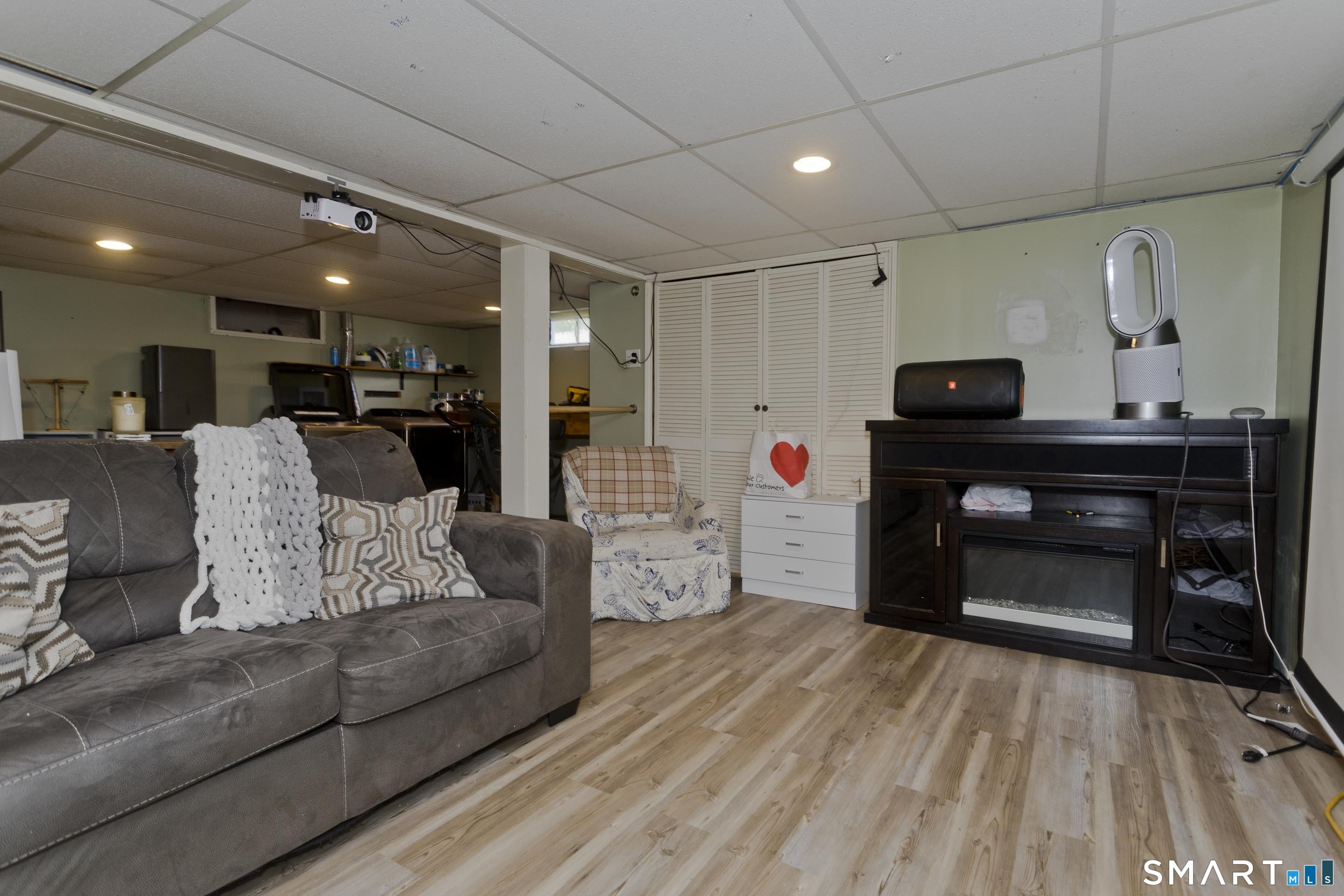309 South Elm Street Windsor Locks, CT 06096 - Photo 27 of 38 a living room with furniture and a fireplace