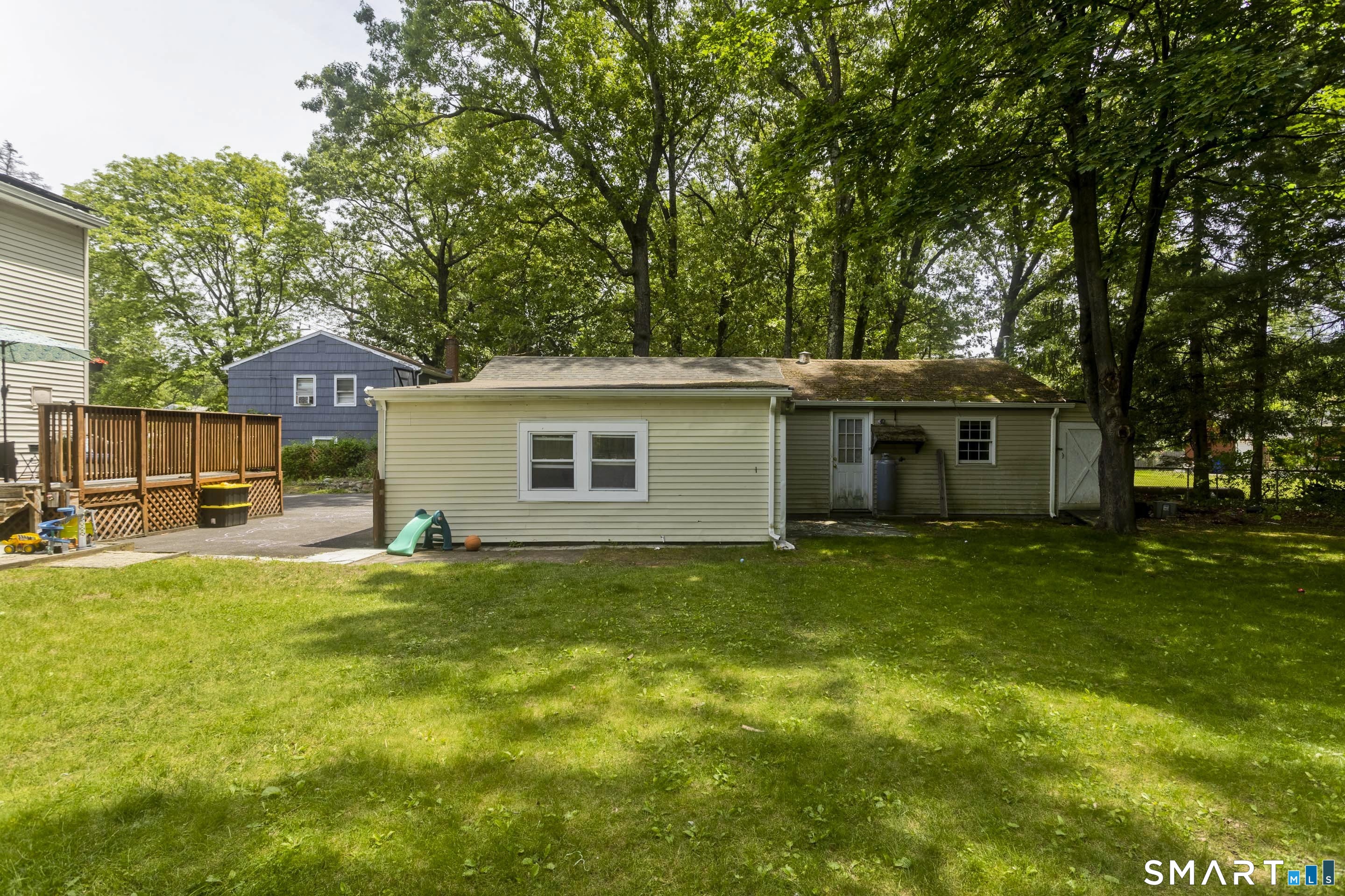 309 South Elm Street Windsor Locks, CT 06096 - Photo 30 of 38 a front view of a house with a garden