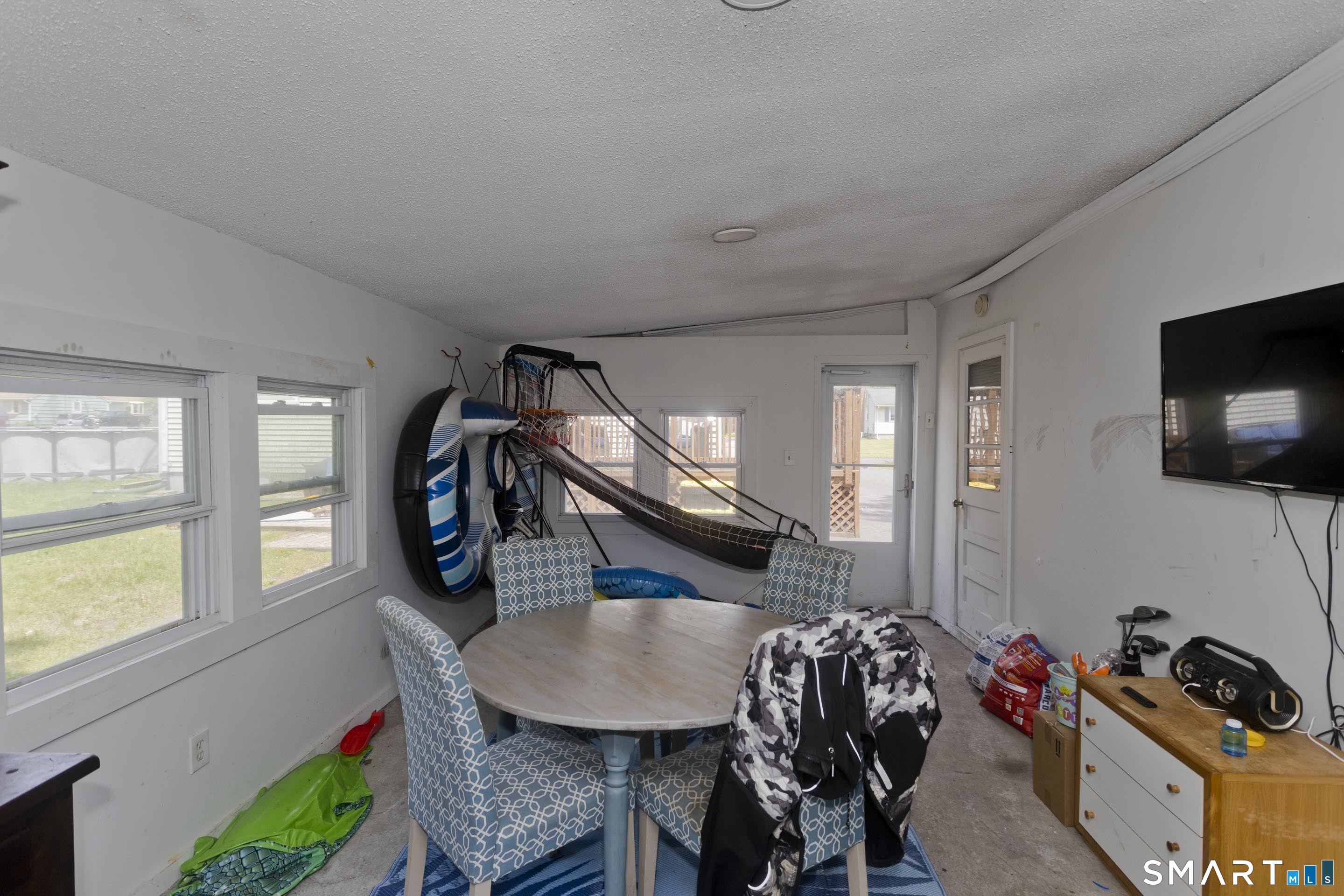 309 South Elm Street Windsor Locks, CT 06096 - Photo 31 of 38 a living room with furniture and a flat screen tv