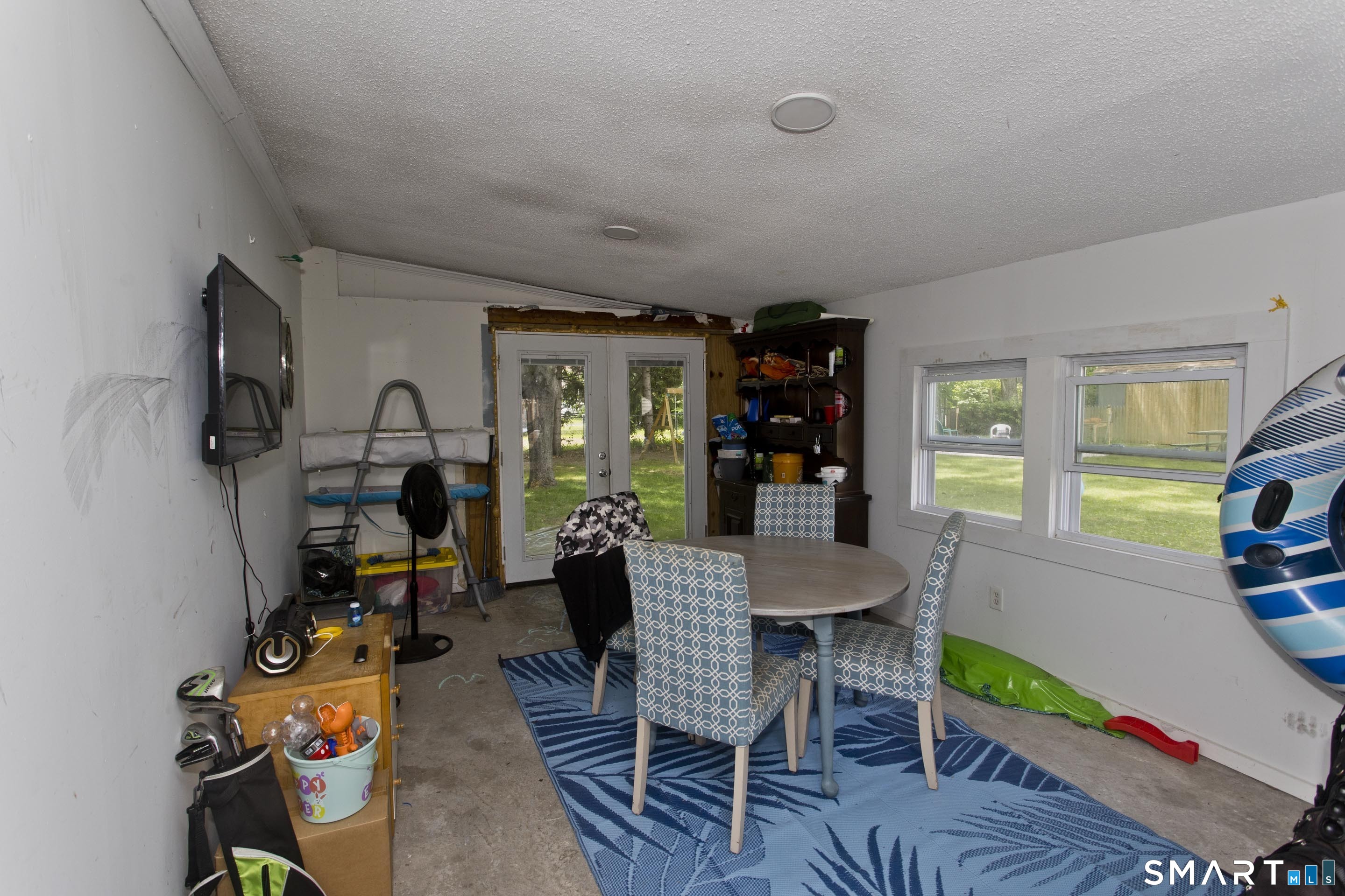 309 South Elm Street Windsor Locks, CT 06096 - Photo 32 of 38 a living room with furniture and a wooden floor