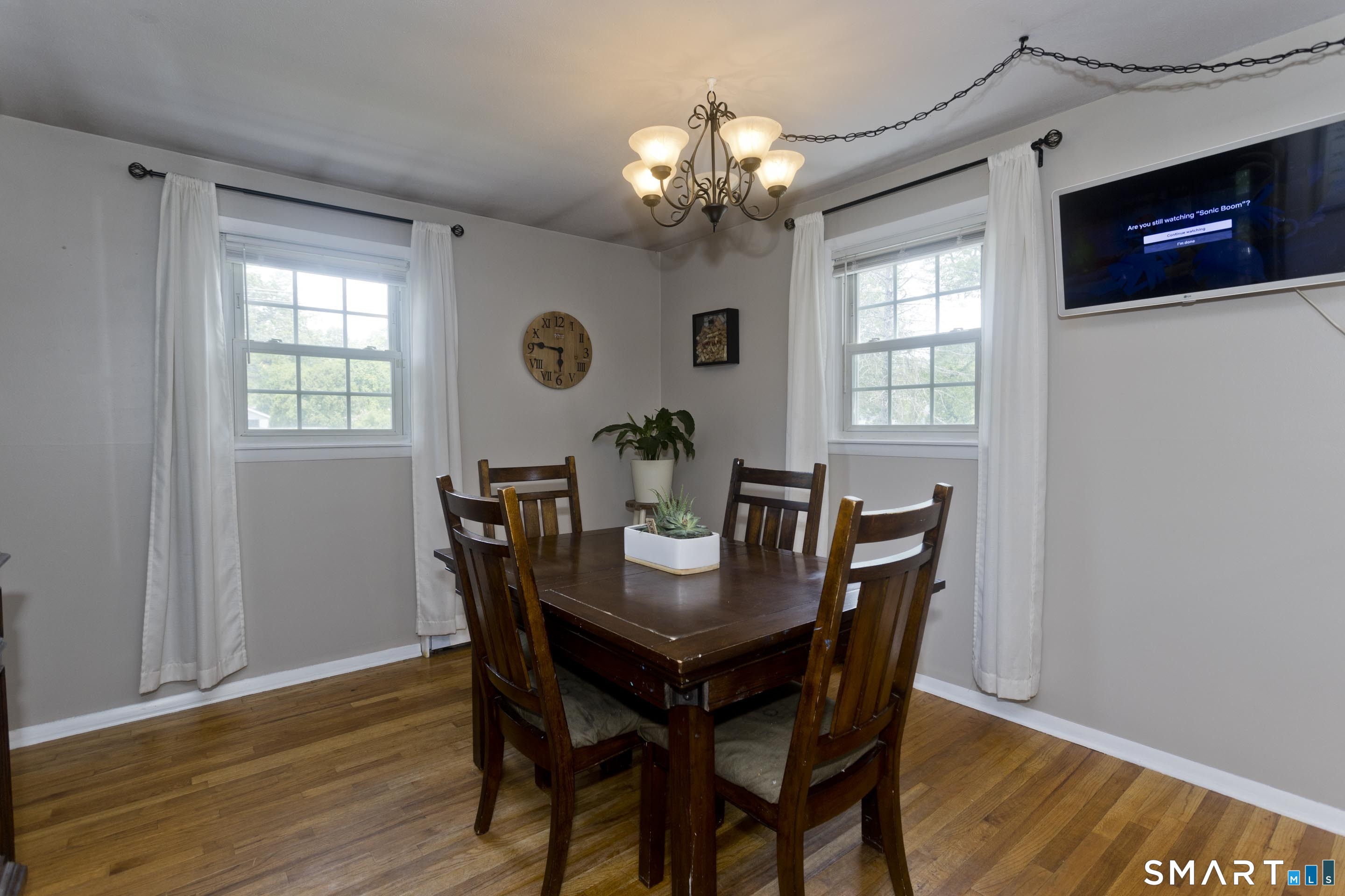 309 South Elm Street Windsor Locks, CT 06096 - Photo 7 of 38 a view of a dining room with furniture window and wooden floor