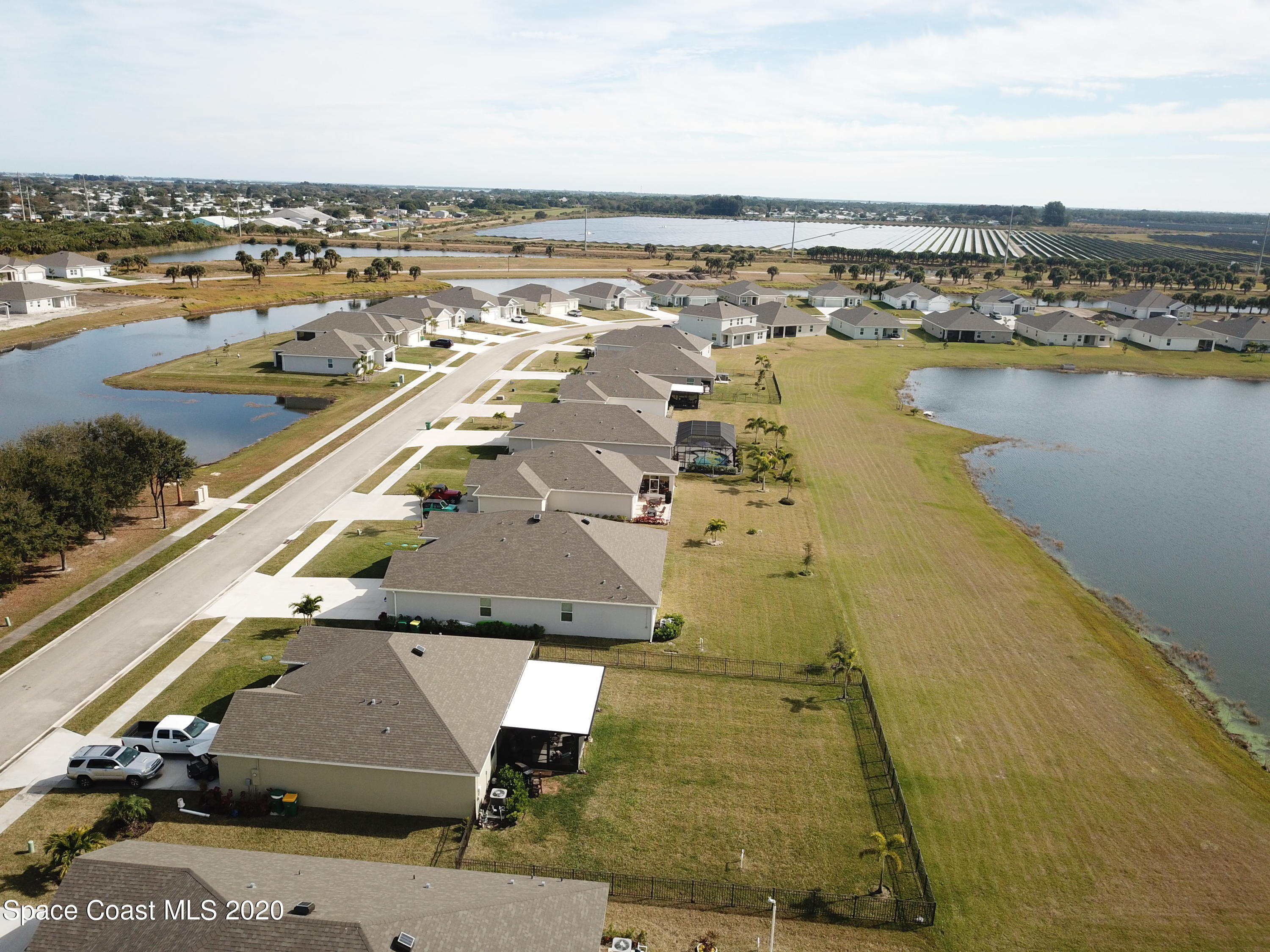 Tbd Micco Road Micco, FL 32976 - Photo 14 of 15 an aerial view of residential houses with outdoor space
