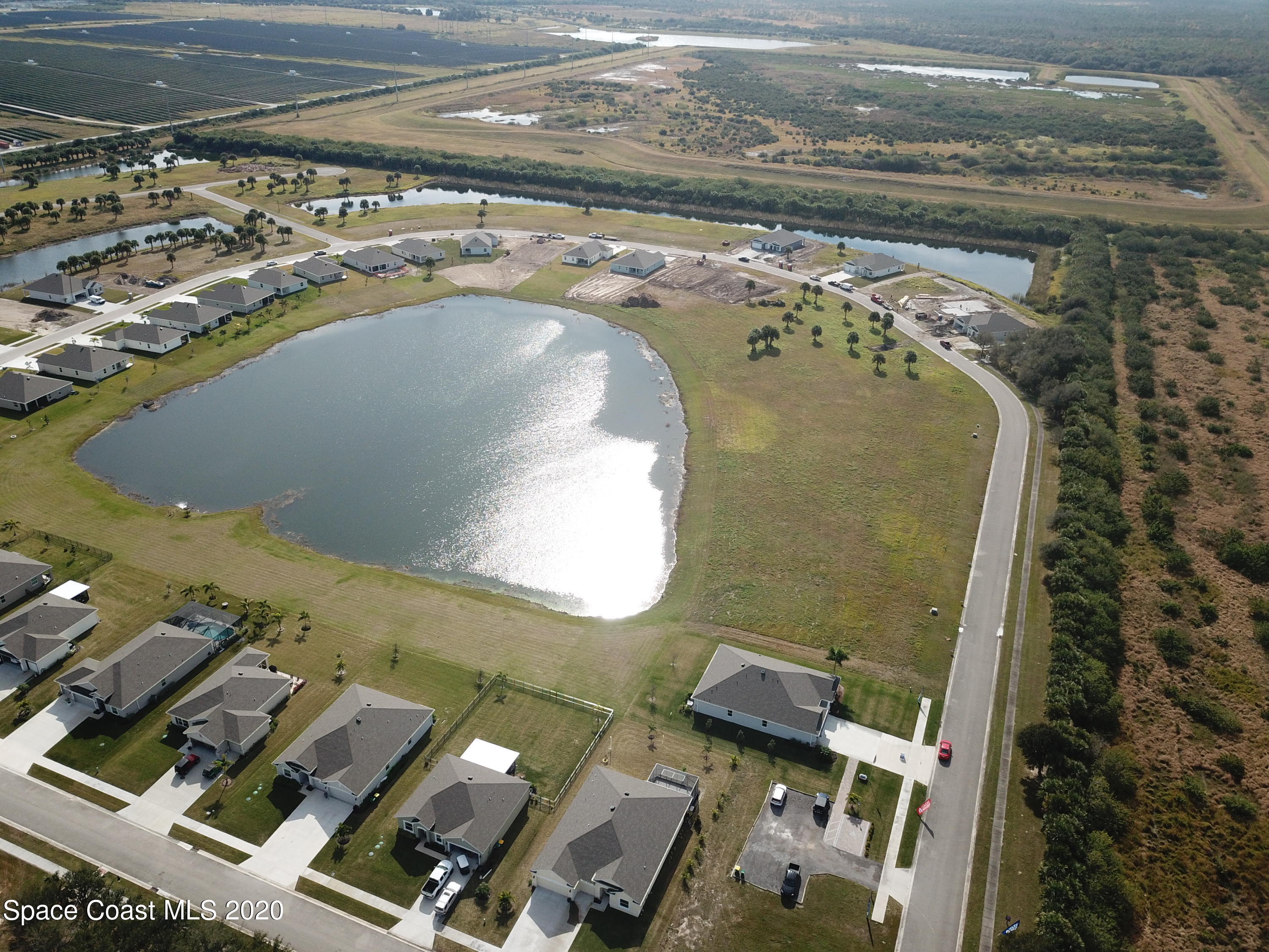 Tbd Micco Road Micco, FL 32976 - Photo 6 of 15 an aerial view of residential houses with outdoor space