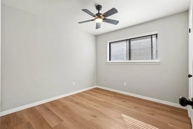 a view of a room with a fan