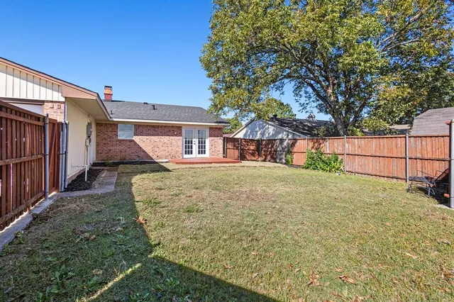 a house view with a garden space