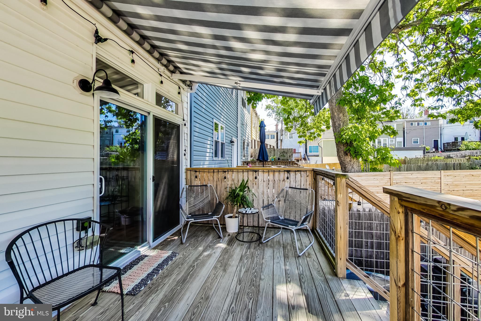 808 Decatur Street Northwest Washington, DC 20011 - Photo 38 of 56 retractable awning on deck