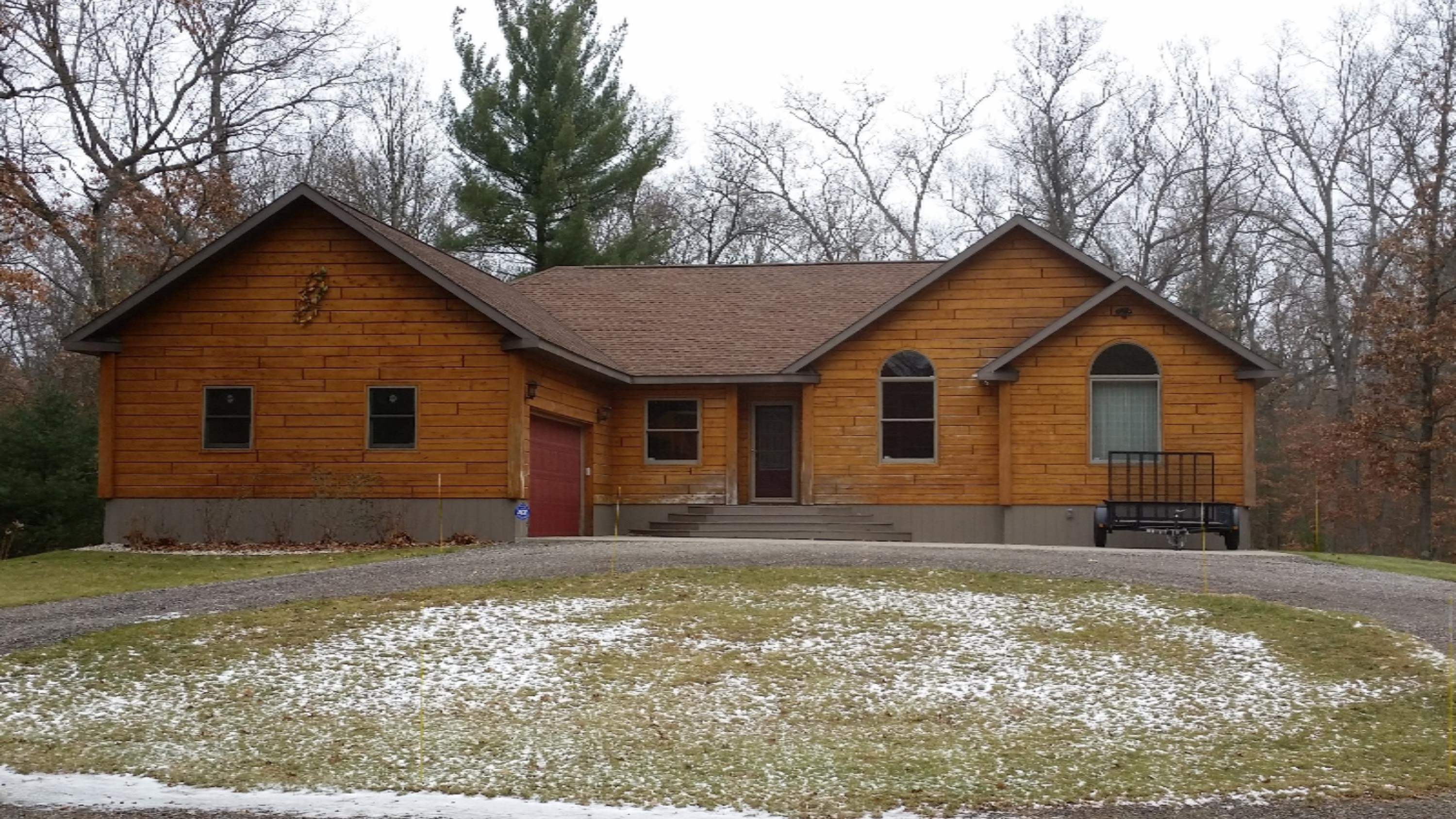 6950 Sweeter Road Twin Lake, MI 49457 - Photo 1 of 28 6950 Sweeter Front View