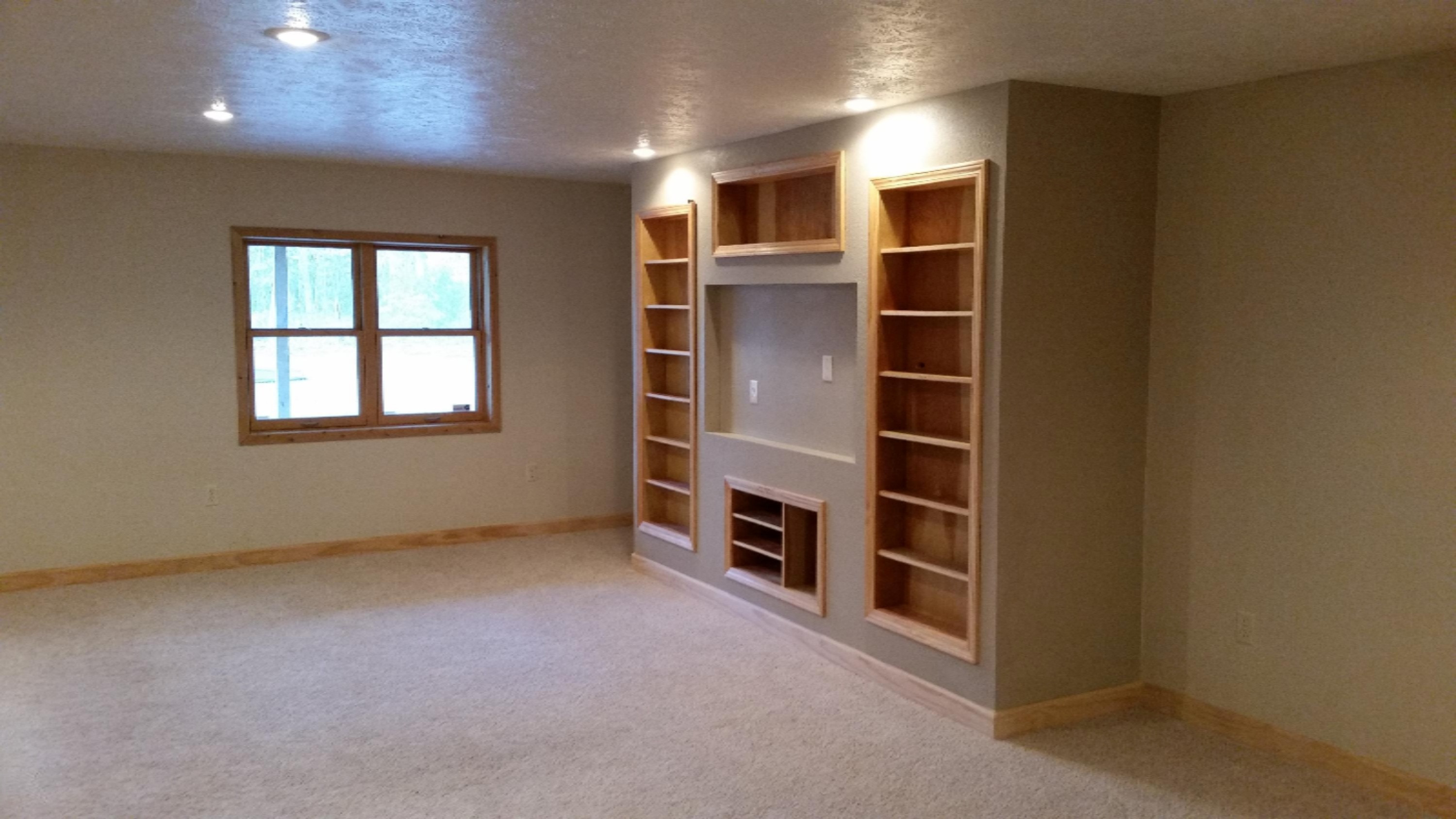 6950 Sweeter Road Twin Lake, MI 49457 - Photo 20 of 28 6950 Sweeter Lower Living Room