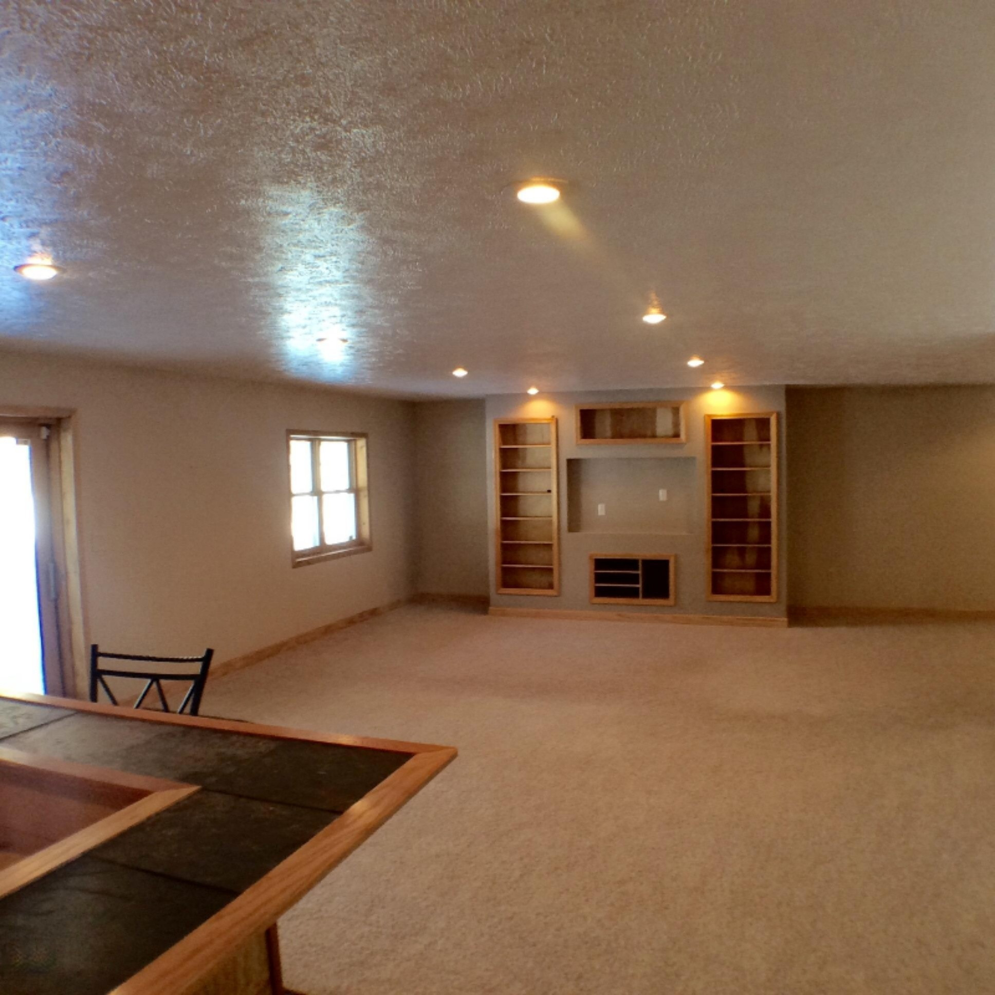 6950 Sweeter Road Twin Lake, MI 49457 - Photo 23 of 28 6950 Sweeter Rd downstairs rec area1