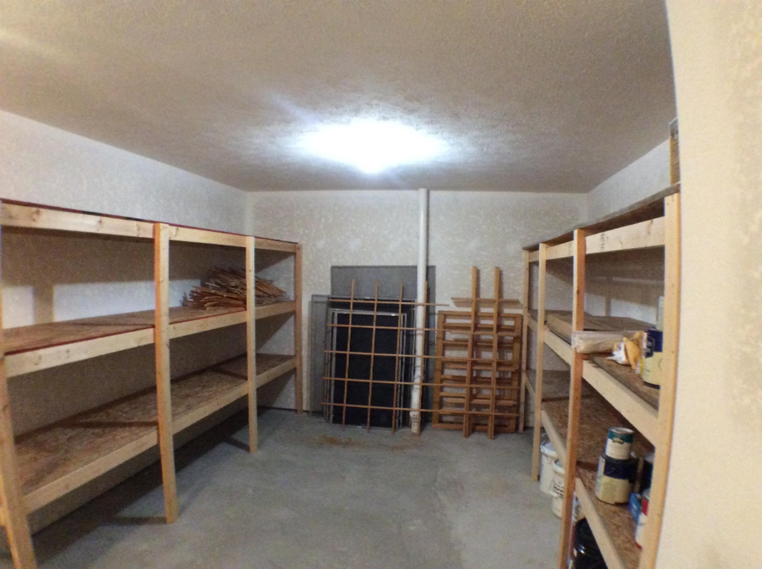 6950 Sweeter Road Twin Lake, MI 49457 - Photo 26 of 28 6950 Sweeter Rd lower level storage room