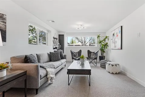 a living room with furniture and window