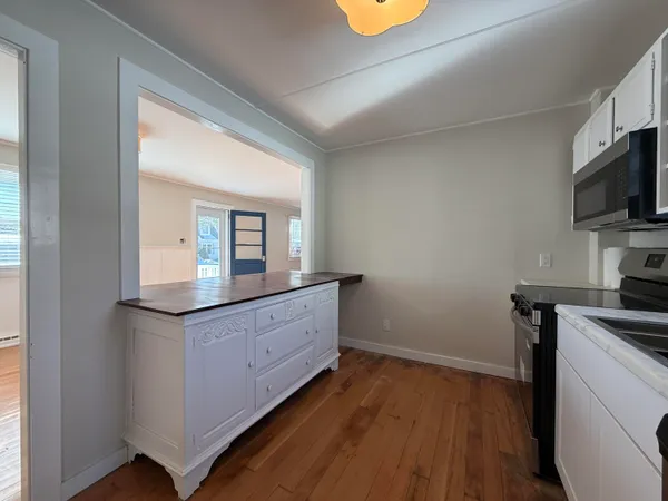 a room with mirror and window