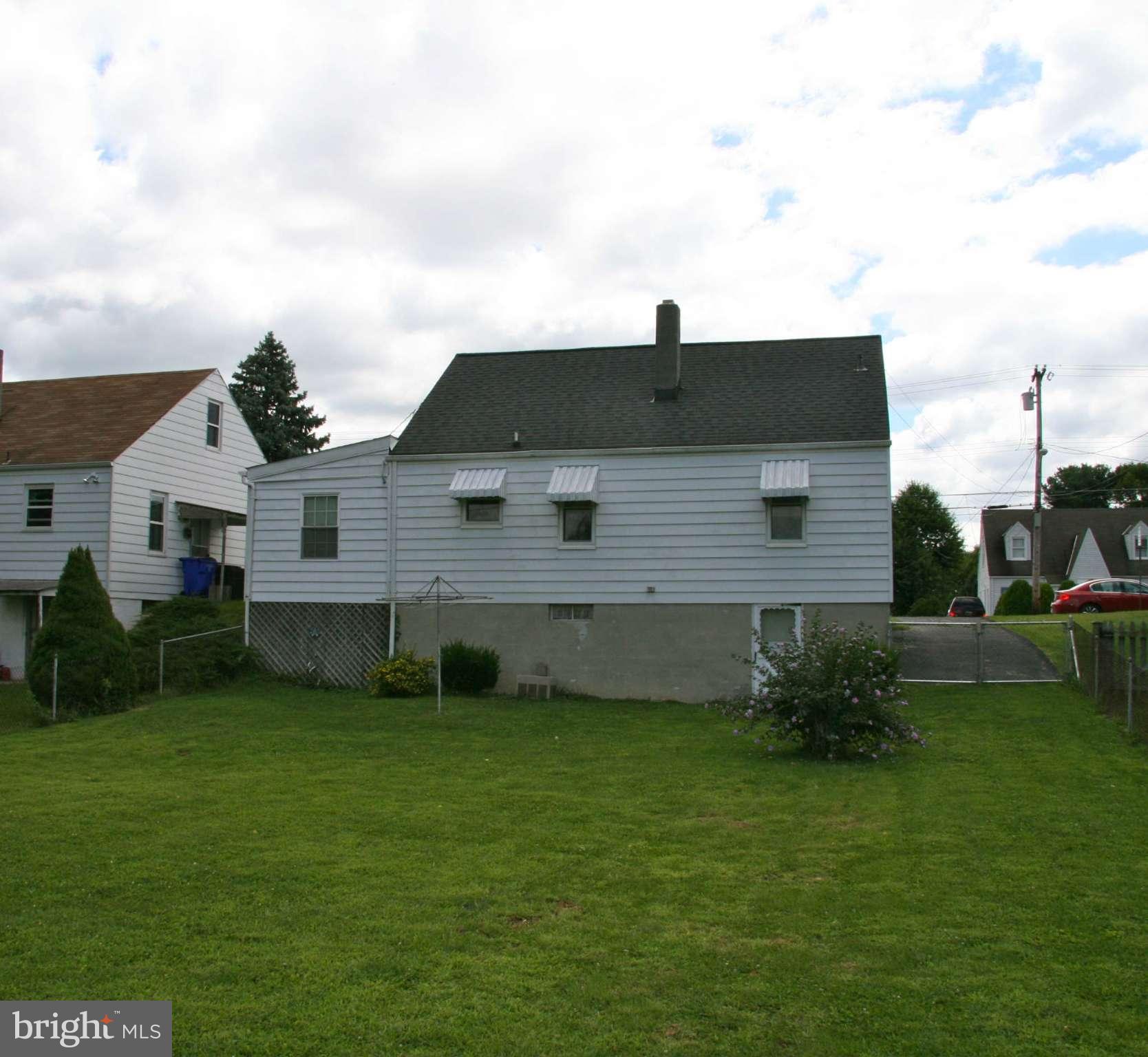 361 Nottingham Road Hagerstown, MD 21740 - Photo 3 of 16 a view of a backyard of the house