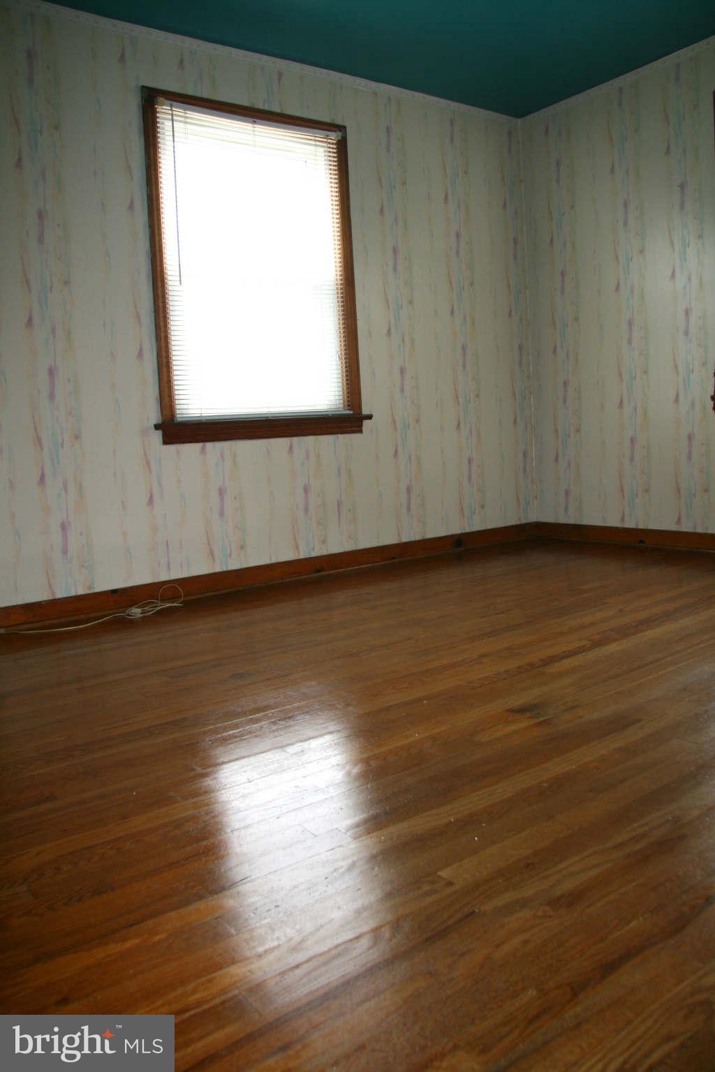 361 Nottingham Road Hagerstown, MD 21740 - Photo 9 of 16 a view of a room with wooden floor and a window