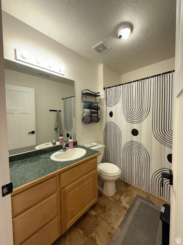 965 North 800 East Springville, UT 84663 - Photo 31 of 46 Full bath featuring vanity, a textured ceiling, and a shower with curtain