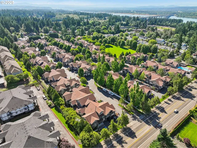 an aerial view of a city with lots of residential buildings