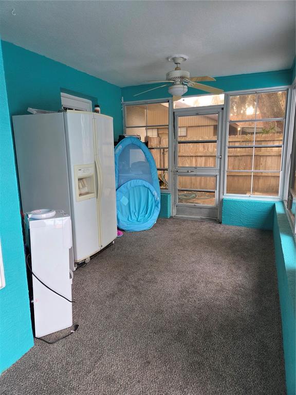 7605 Landmark Drive Spring Hill, FL 34606 - Photo 12 of 26 a view of a livingroom with furniture and a window
