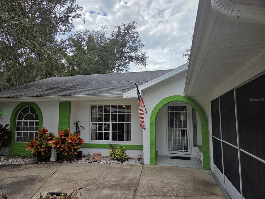7605 Landmark Drive Spring Hill, FL 34606 - Photo 2 of 26 a front view of a house