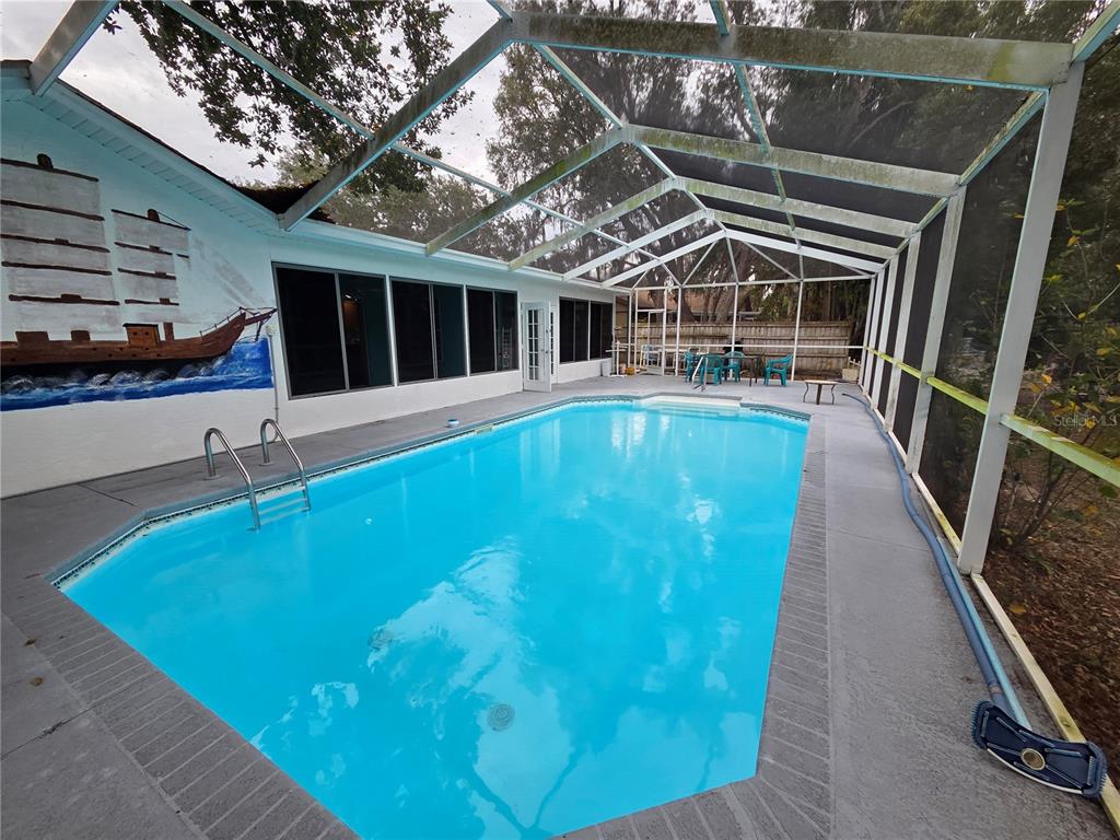 7605 Landmark Drive Spring Hill, FL 34606 - Photo 4 of 26 a view of a house with pool